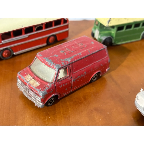 32 - 7 vintage Dinky models. Buses, ambulance, pickup trucks etc