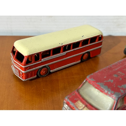 32 - 7 vintage Dinky models. Buses, ambulance, pickup trucks etc