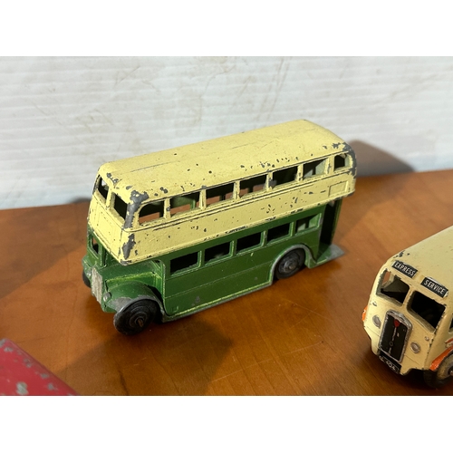 32 - 7 vintage Dinky models. Buses, ambulance, pickup trucks etc