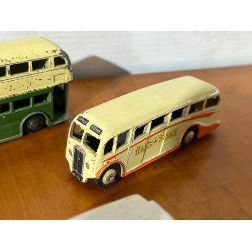 32 - 7 vintage Dinky models. Buses, ambulance, pickup trucks etc