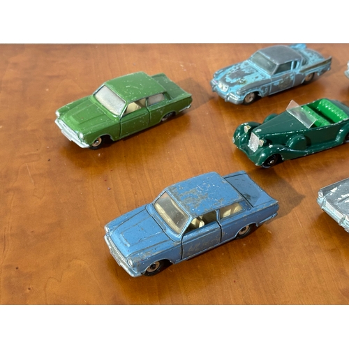 33 - 10 vintage model cars, 8 Dinky models, with Corgi and Tri-ang.