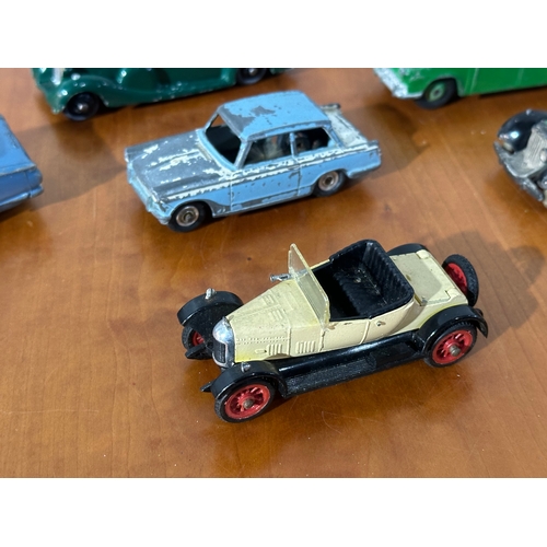 33 - 10 vintage model cars, 8 Dinky models, with Corgi and Tri-ang.