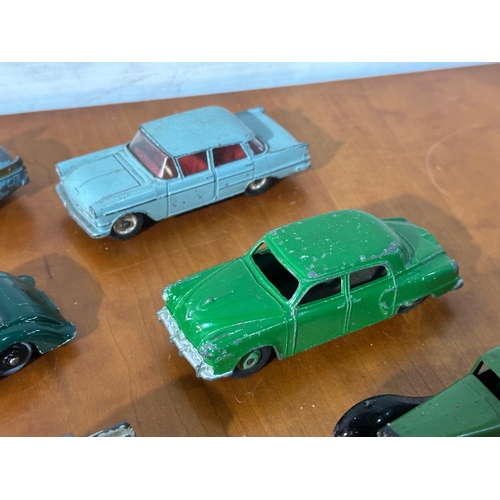 33 - 10 vintage model cars, 8 Dinky models, with Corgi and Tri-ang.