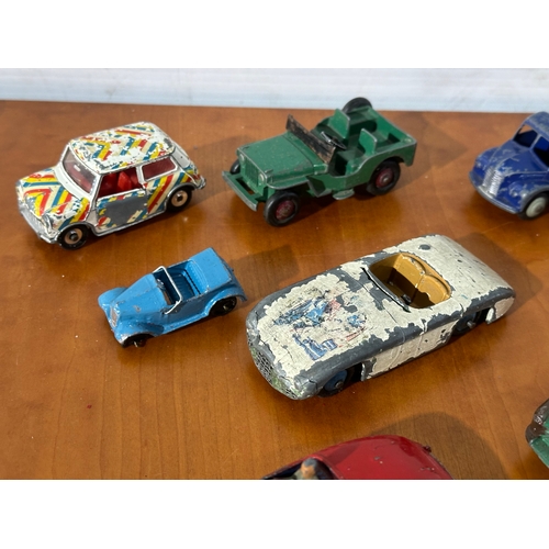 34 - 13 vintage Dinky models.