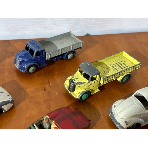 34 - 13 vintage Dinky models.