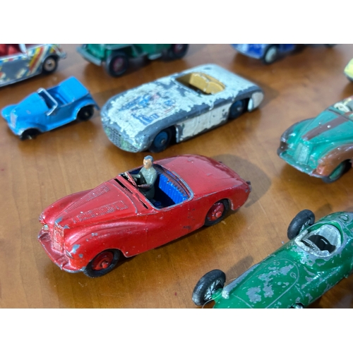 34 - 13 vintage Dinky models.