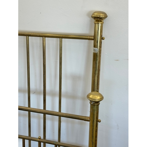 36 - A Victorian brass double bed.