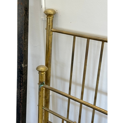 36 - A Victorian brass double bed.