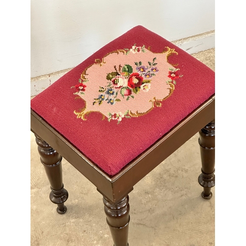 11 - A Victorian stool with tapestry seat. 38.5x31x52cm