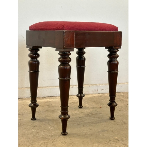11 - A Victorian stool with tapestry seat. 38.5x31x52cm