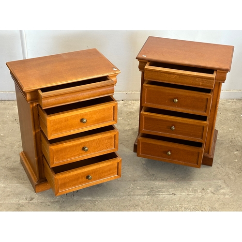 42 - A pair of bedside chests. 52.5x33.5x67cm