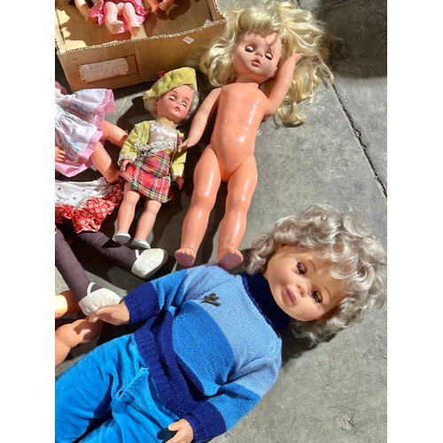 47 - A collection of vintage dolls.