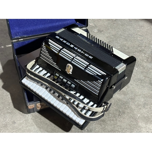16 - A Bandmaster accordion in case