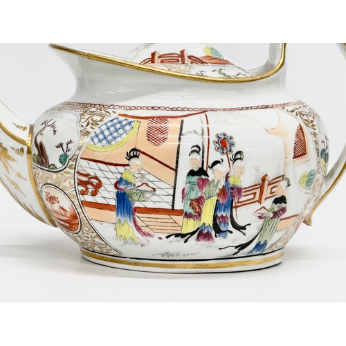 101 - An Early 19th Century New Hall, hand painted porcelain teapot in the chinoiserie style. Early 19th C... 