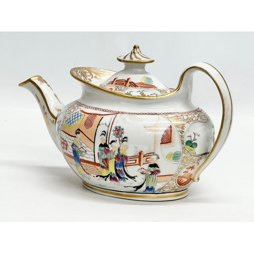 101 - An Early 19th Century New Hall, hand painted porcelain teapot in the chinoiserie style. Early 19th C... 