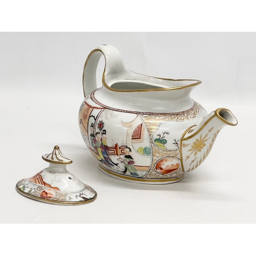 101 - An Early 19th Century New Hall, hand painted porcelain teapot in the chinoiserie style. Early 19th C... 