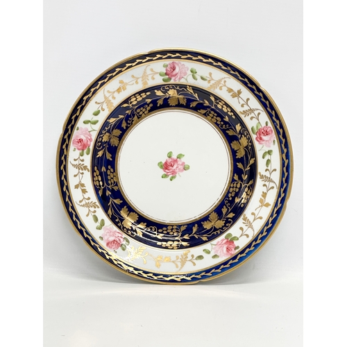 105 - A set of 4 Early 19th Century English hand painted cabinet plates. By Coalport. With gilt flower mot... 