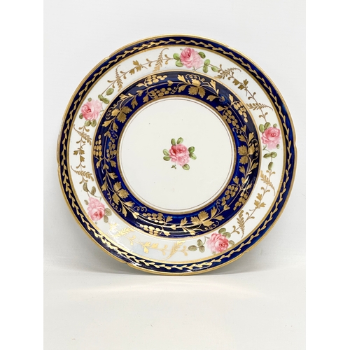 105 - A set of 4 Early 19th Century English hand painted cabinet plates. By Coalport. With gilt flower mot... 