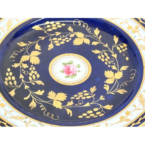 105 - A set of 4 Early 19th Century English hand painted cabinet plates. By Coalport. With gilt flower mot... 