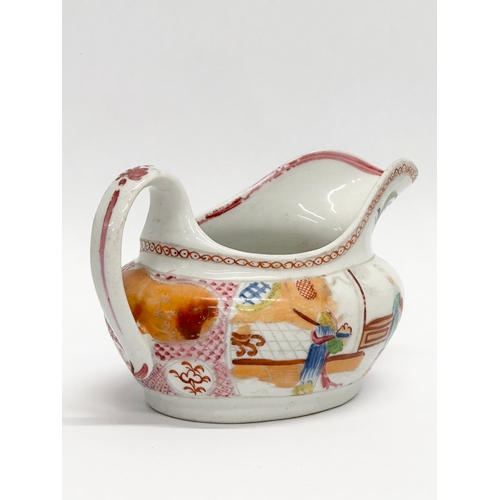 108 - New Hall. An Early 19th Century English creamer in the chinoiserie style. Circa 1800-1805. 14x8.5x8c... 