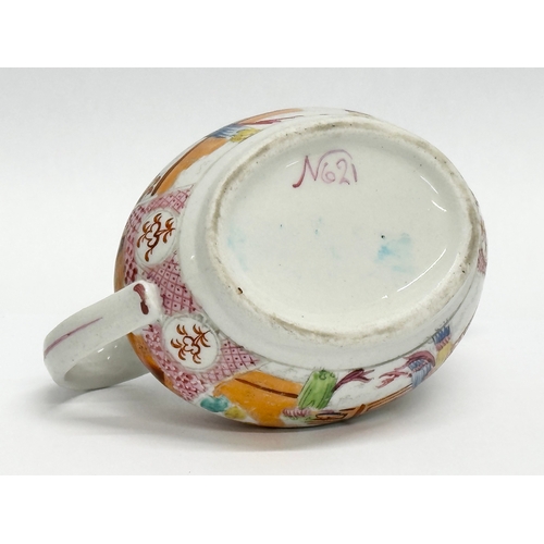 108 - New Hall. An Early 19th Century English creamer in the chinoiserie style. Circa 1800-1805. 14x8.5x8c... 