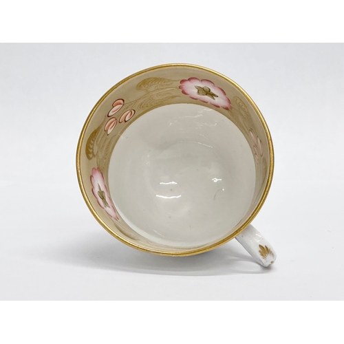 114 - New Hall. An Early 19th Century hand painted cup and saucer. Circa 1820.