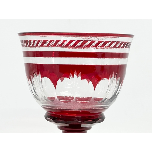 73 - A Late 19th Century Bohemian ruby glass campana vase. Late 19th/Early 20th Century. 14x19cm