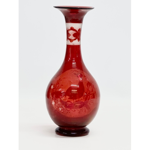 75 - A Late 19th Century Bohemian ruby glass vase. 24cm