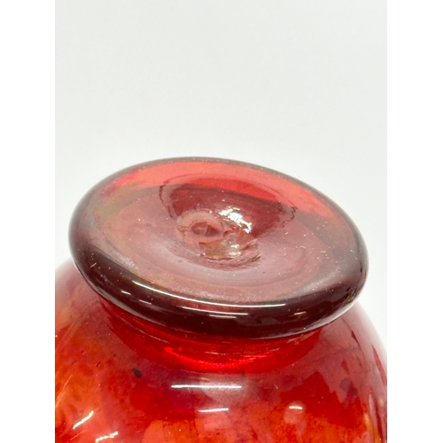 75 - A Late 19th Century Bohemian ruby glass vase. 24cm