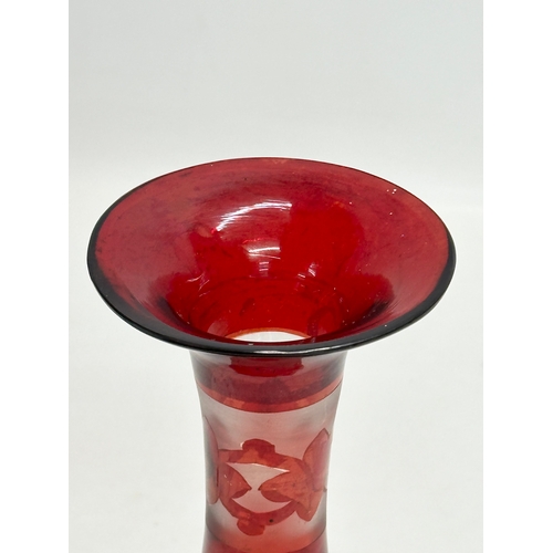 75 - A Late 19th Century Bohemian ruby glass vase. 24cm