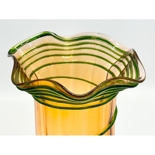 69 - A Late 19th/Early 20th Century Bohemian Art Nouveau amber glass vase with green threading. Circa 190... 