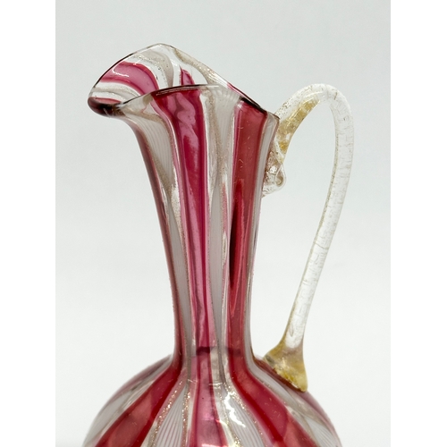 87 - A Mid 20th Century Murano Zanfirico glass ewer. Attributed to Fratelli Toso. 14cm