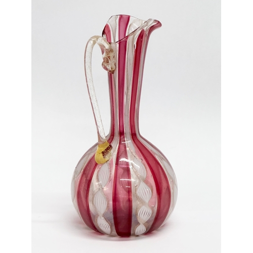 87 - A Mid 20th Century Murano Zanfirico glass ewer. Attributed to Fratelli Toso. 14cm