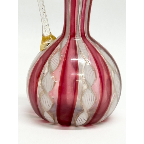 87 - A Mid 20th Century Murano Zanfirico glass ewer. Attributed to Fratelli Toso. 14cm