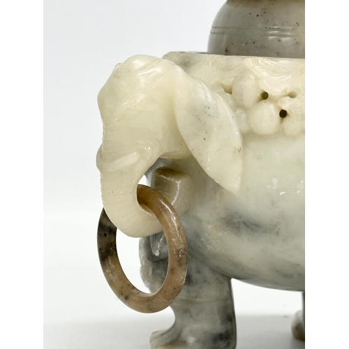 59 - A 19th Century Chinese carved jade, tripod incense burner. With carved Foo Dog cover, elephant ring ... 