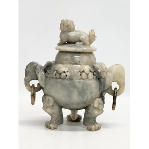 59 - A 19th Century Chinese carved jade, tripod incense burner. With carved Foo Dog cover, elephant ring ... 