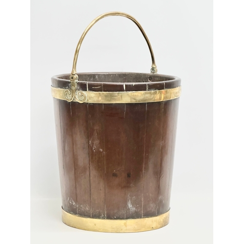 6 - A large good quality Irish 18th Century, George III mahogany and brass bound peat bucket. Circa 1780... 