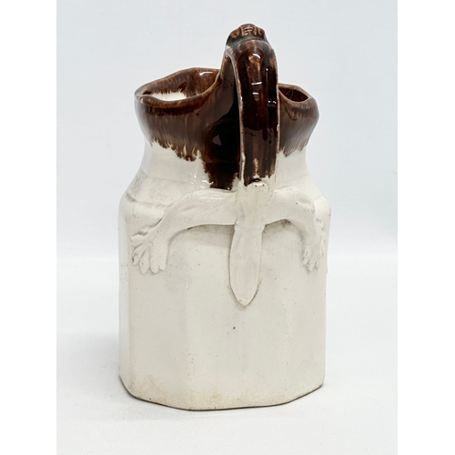 417 - An unusual Mid 19th Century Early Victorian glazed jug. 13x9x16cm