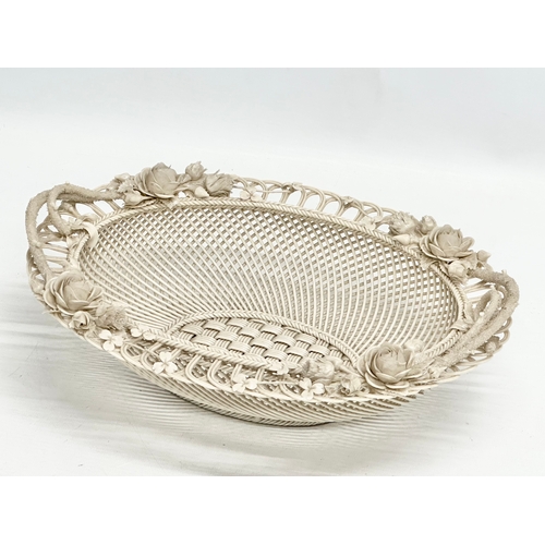 137 - A large 19th Century 1st Period Belleek Pottery “Sydenham Twig” woven basket. 31x23.5x10cm