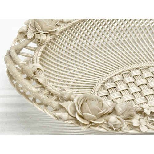 137 - A large 19th Century 1st Period Belleek Pottery “Sydenham Twig” woven basket. 31x23.5x10cm