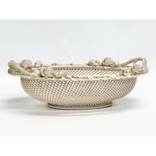 137 - A large 19th Century 1st Period Belleek Pottery “Sydenham Twig” woven basket. 31x23.5x10cm