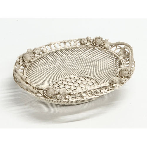 137 - A large 19th Century 1st Period Belleek Pottery “Sydenham Twig” woven basket. 31x23.5x10cm