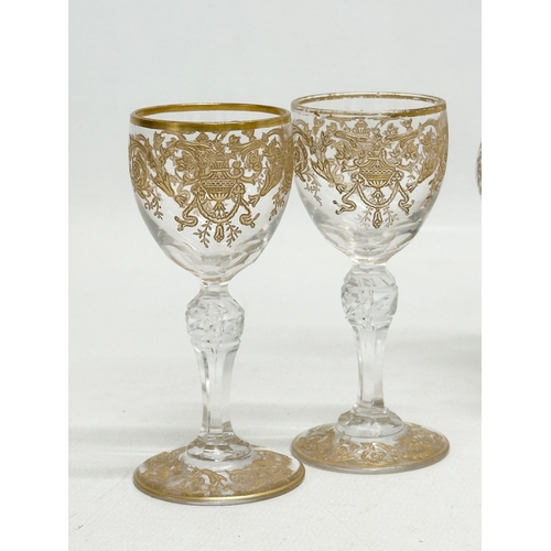 23 - A fine quality Late 19th/Early 20th Century French gilt enamel drinks service. A pair of decanters 2... 