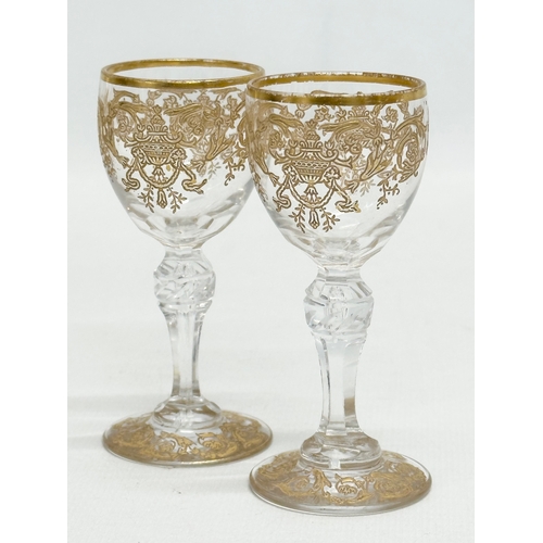 23 - A fine quality Late 19th/Early 20th Century French gilt enamel drinks service. A pair of decanters 2... 