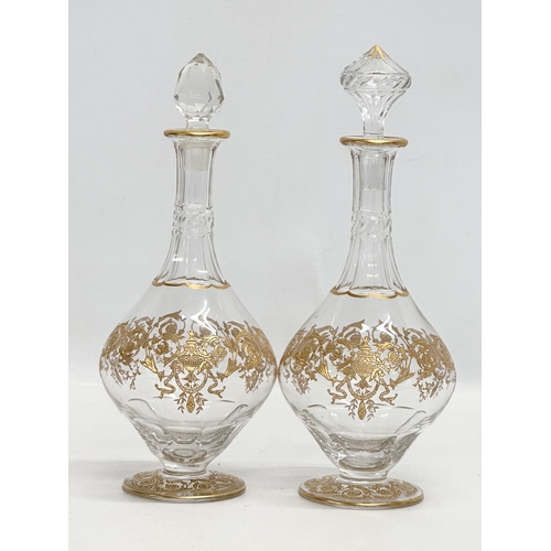 23 - A fine quality Late 19th/Early 20th Century French gilt enamel drinks service. A pair of decanters 2... 