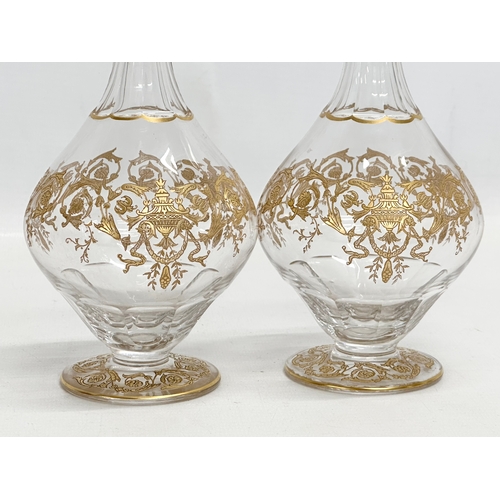 23 - A fine quality Late 19th/Early 20th Century French gilt enamel drinks service. A pair of decanters 2... 