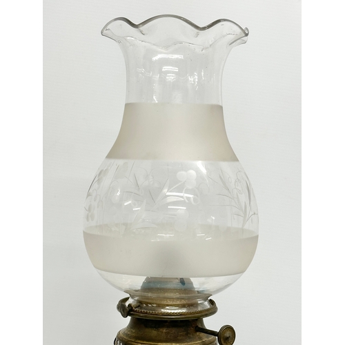 89 - A large 19th Century Bohemian painted opaline glass oil lamp a on gilt brass base. 66cm