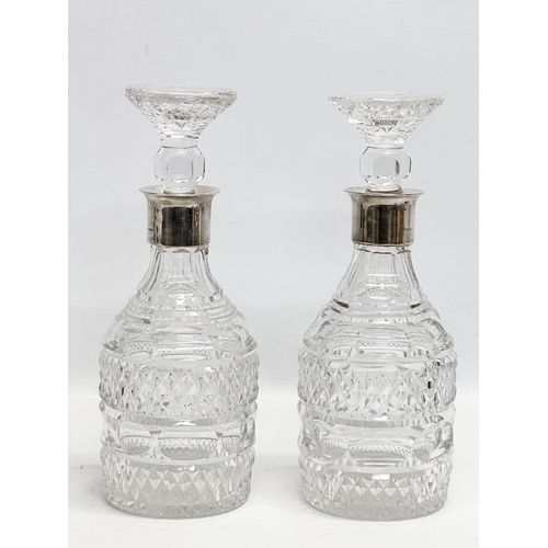 24 - A rare excellent quality harlequin set of 5, Early 19th Century Irish glass decanters, with later si... 