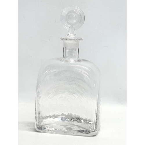 441 - Frank Thrower. A 1960’s rippled glass decanter. Designed by Frank Thrower for Darlington. 12x8x25.5c... 