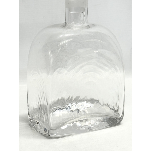 441 - Frank Thrower. A 1960’s rippled glass decanter. Designed by Frank Thrower for Darlington. 12x8x25.5c... 